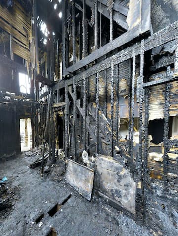 The burnt remains of the inside of a house